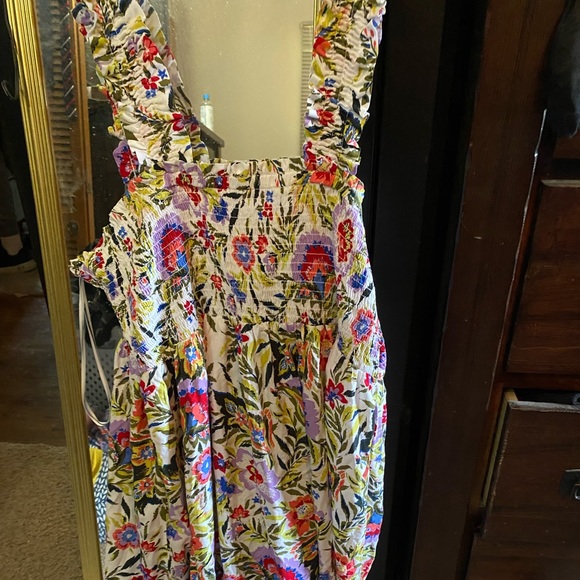 White/ floral knee length dress. Never worn. Shoulder straps are really elastic - Picture 1 of 2